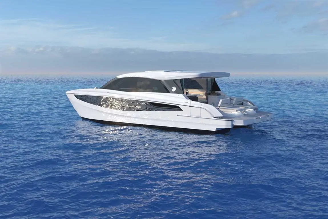 A sleek white yacht cruising on calm blue waters, featuring a modern design and spacious seating area.